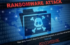 Ransomware attacks illustration with skull and crossbones on a computer screen telling the user to pay money